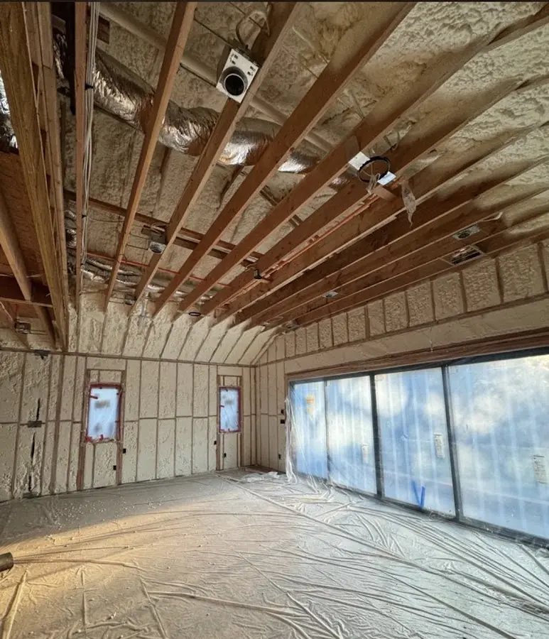 Interior walls and ceiling insulated with spray foam during new construction in New Paltz