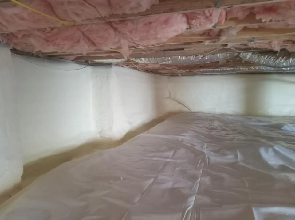 Crawl space encapsulation with closed-cell spray foam for Commercial Roof Restoration in New Paltz